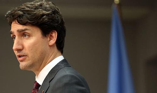 Opposition in Ottawa assails Trudeau for grabbing, jostling MPs