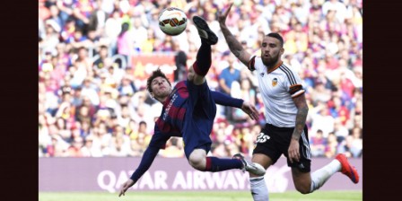 Barca edge past Valencia