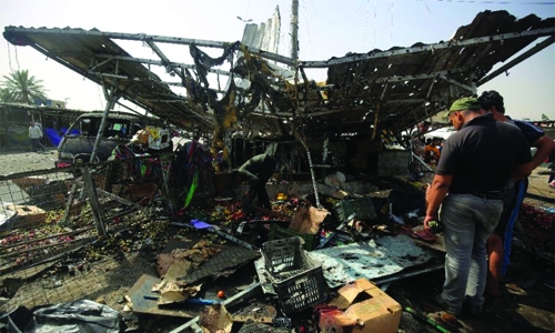 Suicide bomber kills at least 11 at Baghdad market
