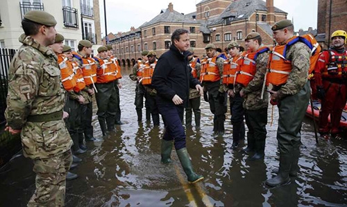 British PM Cameron visits flood-hit city of York