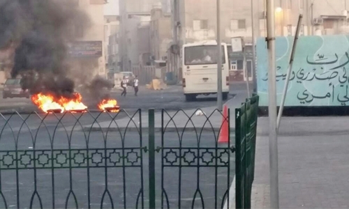 Vandals block roads to school by setting fire