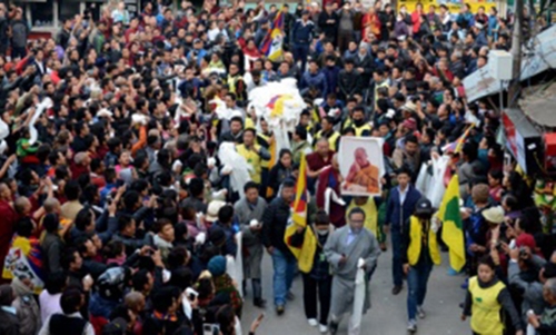 Hundreds of Tibetans join funeral procession of schoolboy