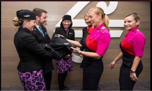Qantas crew don All Blacks jerseys after World Cup defeat