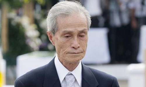 Postman who survived Nagasaki A-bomb dies at 88