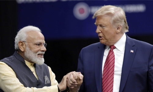 Trump visits key states with Modi, Morrison 