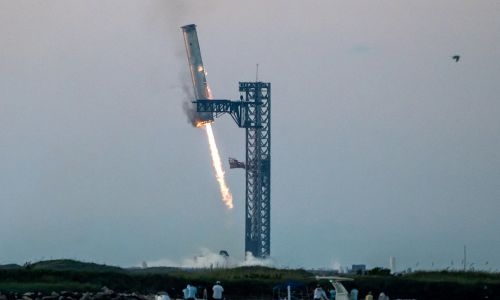 In a first, SpaceX 'catches' megarocket booster after test flight