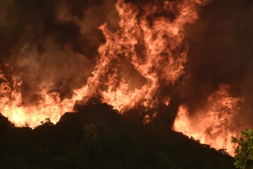 Greek fires continue to rage as toll rises to 21