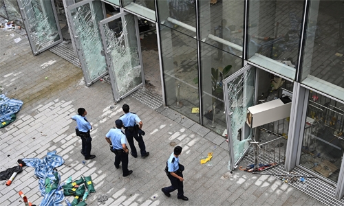 Tense calm grips Hong Kong