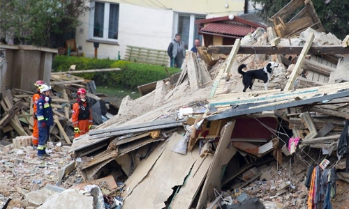 Six people killed as building collapses