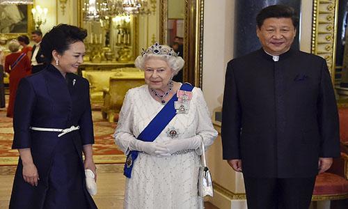 Pomp and protests as China's Xi meets Queen Elizabeth II