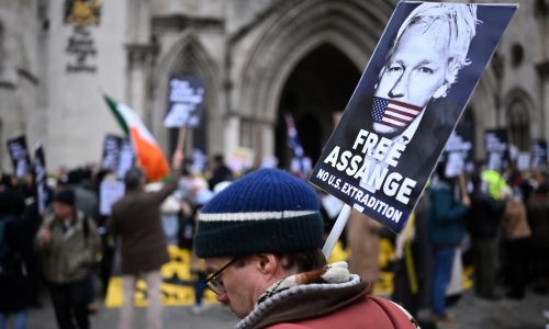 Sick Assange absent at key hearing against extradition to US