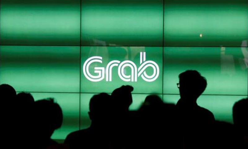 Grab raises $2 bn to fight ride-hailing competition