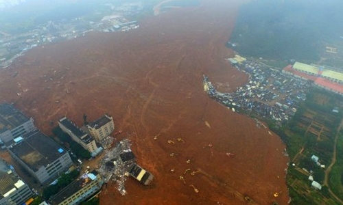 Dozens still missing in China landslide as hopes fade