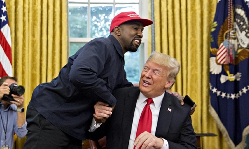 Kanye West loves and hugs Trump