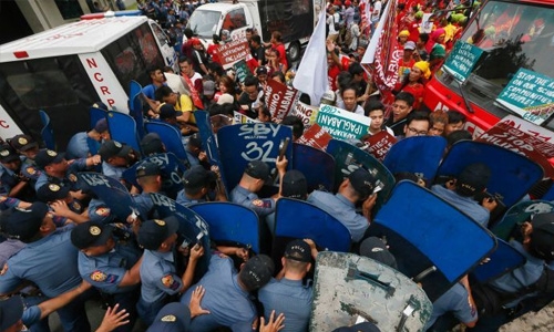Philippine police van runs over protesters