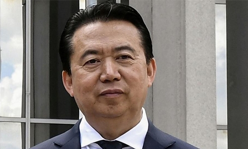 China’s former Interpol chief pleads guilty to bribery