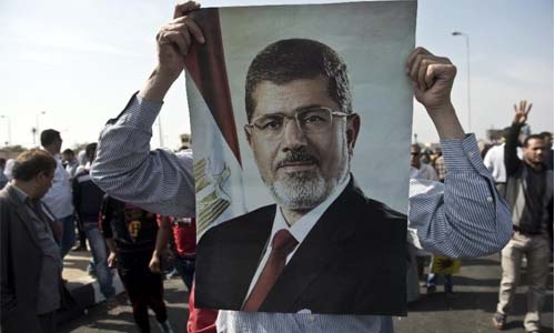 Egypt hands stiff jail terms to 23 Morsi supporters