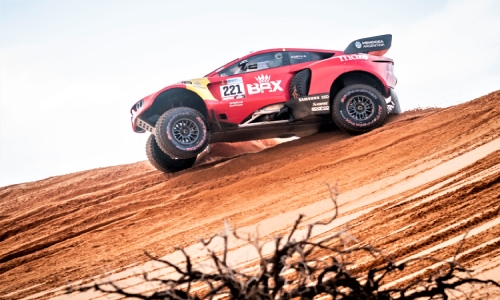 Loeb boosts Dakar bid with historic stage victory for BRX