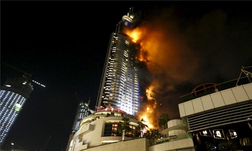 UAE releases two men who took hotel-fire selfie