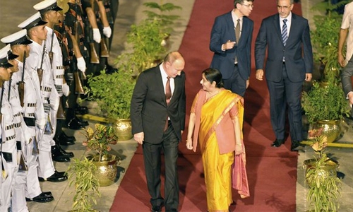 Russia’s Putin arrives in India, seeks arms deals