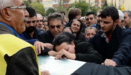 Denouncing Erdogan, Turks lay Ankara victims to rest