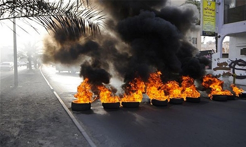 Bahrainis face trial for burning tyres