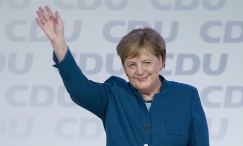 End of an era : Merkel passes torch to new leader