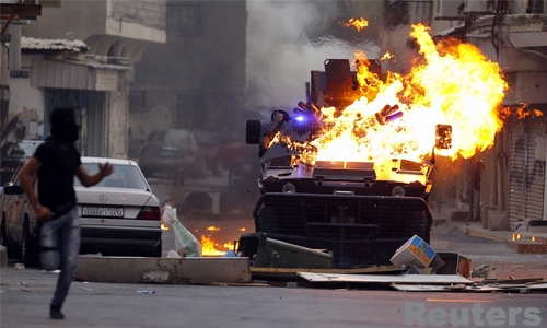  Ten Bahrainis jailed for setting police vehicle on fire