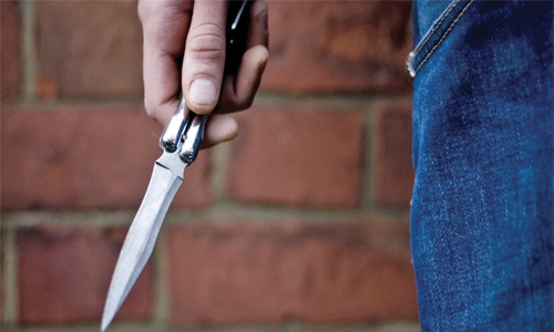 Man stabs wife for not giving house key