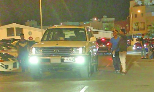 Are drivers in Bahrain at the mercy of illegal car washers to park their vehicles in open spaces?
