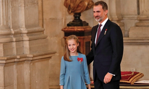 On his birthday, Spain’s king honours young daughter