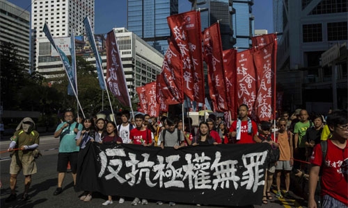 Crowds rally in Hong Kong after activists jailed