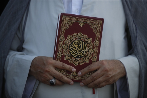Quran set alight at protest outside Sweden parliament