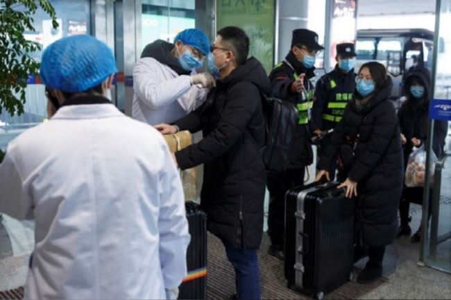 China virus toll rises to 81