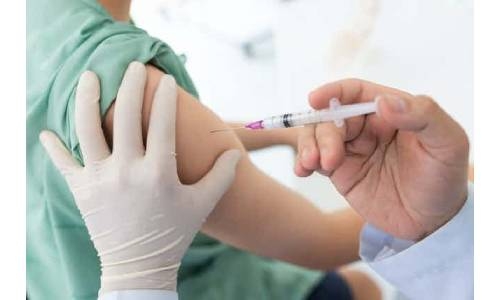 COVID-19 vaccines may be less effective against Omicron: WHO