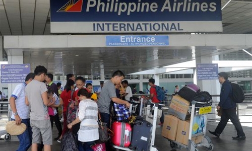 Runway damage cripples Philippines' main airport