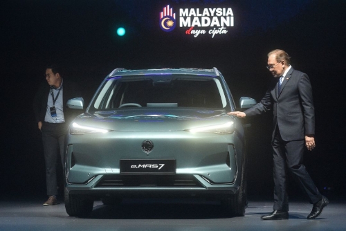 Malaysia launches first locally made electric vehicle