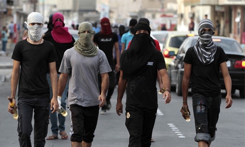 Bahrain jails five men for attacking cops