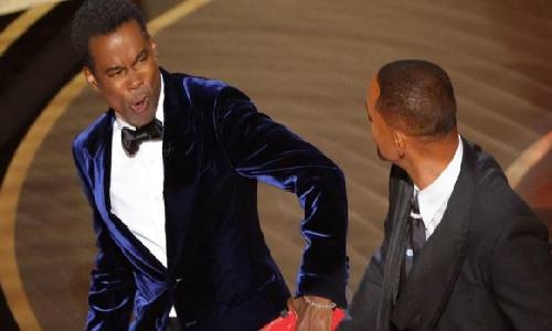 Oscars organiser says it does not condone violence after Will Smith slaps Chris Rock