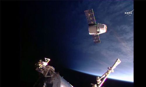 SpaceX cargo arrives  at crowded space station