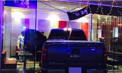 Expats die as car crashes into McDonald's