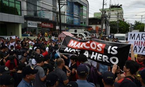 Protests as Philippine dictator Marcos given hero's burial