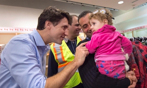 First Canadian plane with Syrian refugees arrives in Toronto