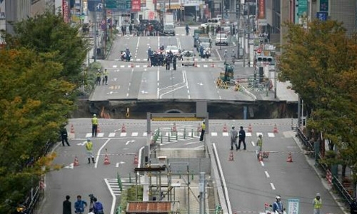 Giant sinkhole swallows Japan city street