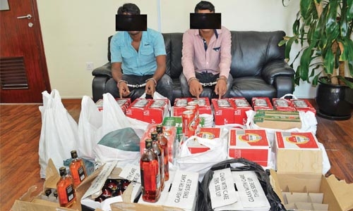 Two held for illegal liquor sale