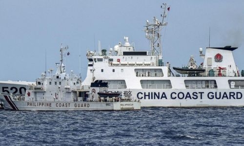 China says Philippine boat’s ‘provocative action’ caused near-crash