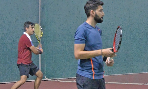 Janahi, Hassan lift doubles title