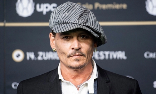 Johnny Depp to play war photographer