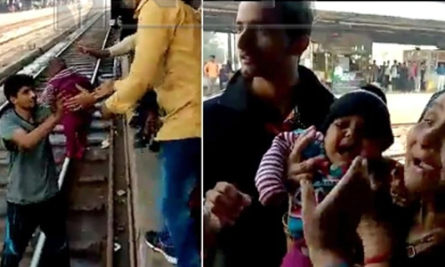 Indian baby survives being run over by train