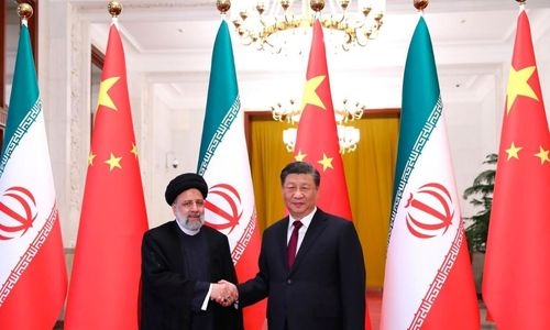 China, Iran call for sanctions on Tehran to be lifted; Xi to visit